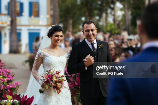 bride and her father entering in wedding - bride father stock pictures, royalty-free photos & images