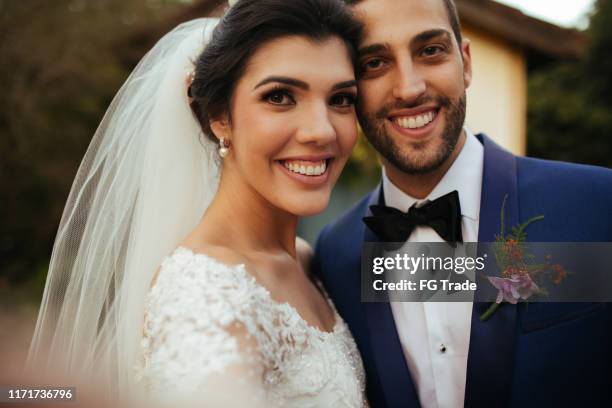 bride and groom taking a selfie at wedding day - bridegroom stock pictures, royalty-free photos & images