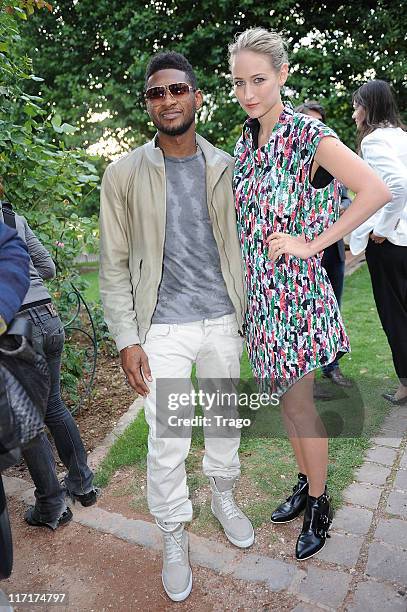 Usher and Leelee Sobieski during the Adam Kimmel Menswear Spring/Summer 2012 show as part of Paris Fashion Week on June 23, 2011 in Paris, France.