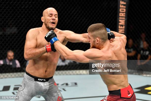 Ismail Naurdiev of Austria and Siyar Bahadurzada of Afghanistan exchange punches in their welterweight bout during the UFC Fight Night event at Royal...