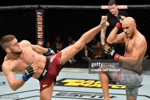 Ismail Naurdiev of Austria kicks Siyar Bahadurzada of Afghanistan in their welterweight bout during the UFC Fight Night event at Royal Arena on...