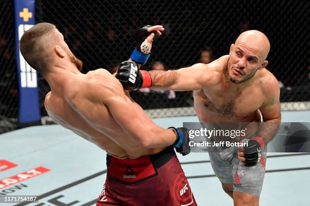 Siyar Bahadurzada of Afghanistan punches Ismail Naurdiev of Austria in their welterweight bout during the UFC Fight Night event at Royal Arena on...