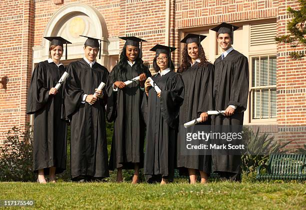 college graduates, outside on campus - perfect moment stock-fotos und bilder