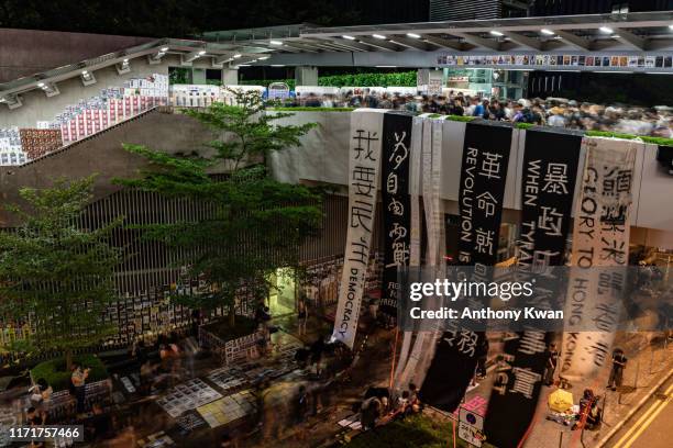 Pro-democracy protesters hang banner off a pedestrian bridge outside of Central Government Complex on September 28, 2019 in Hong Kong, China. Hong...