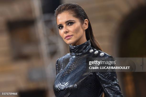 British singer Cheryl, also known as Cheryl Cole, presents a creation for L'Oreal during the Women's Spring-Summer 2020 Ready-to-Wear collection...