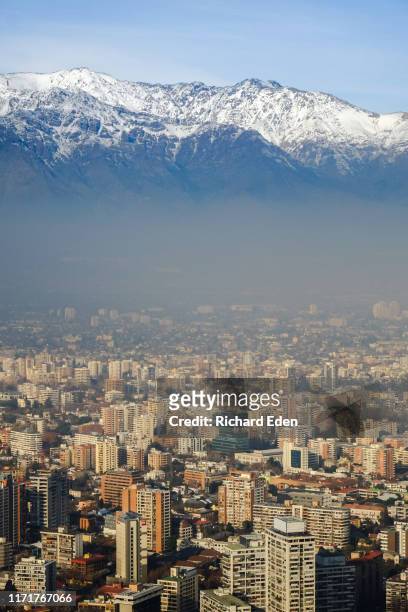 santiago chile skyline with the andes mountains as backdrop - chile skyline stock pictures, royalty-free photos & images