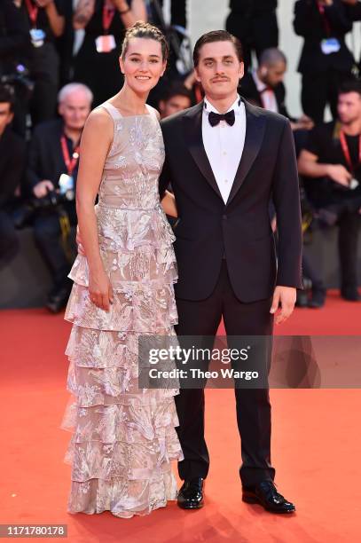 Luca Marinelli and Alissa Jung walks the red carpet ahead of the "Martin Eden" screening during the 76th Venice Film Festival at Sala Grande on...