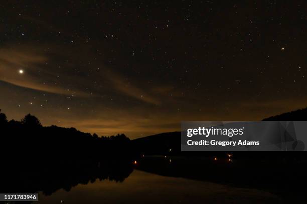 a star-filled summer night over a peaceful lake - new york state landscape stock pictures, royalty-free photos & images