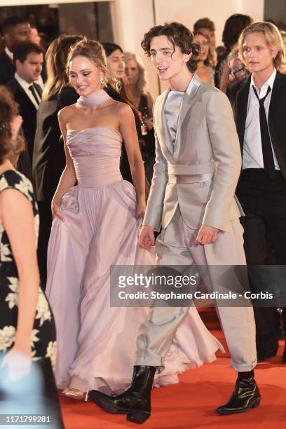 Lily Rose Depp and Timothee Chalamet attend "The King" red carpet during the 76th Venice Film Festival at Sala Grande on September 02, 2019 in...