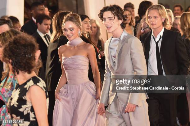 Lily Rose Depp and Timothee Chalamet attend "The King" red carpet during the 76th Venice Film Festival at Sala Grande on September 02, 2019 in...