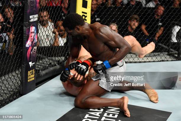 Jared Cannonier punches Jack Hermansson of Sweden in their middleweight bout during the UFC Fight Night event at Royal Arena on September 28, 2019 in...