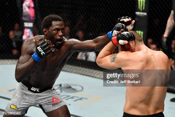 Jared Cannonier punches Jack Hermansson of Sweden in their middleweight bout during the UFC Fight Night event at Royal Arena on September 28, 2019 in...