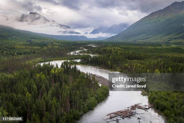 drone point of view looking up the eagle river toward the chugach mountains, alaska - cook inlet stock pictures, royalty-free photos & images