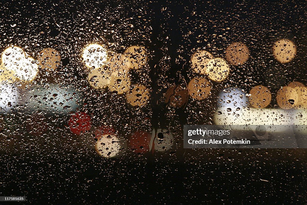 Rain in autumn. wet night windows - abstract background