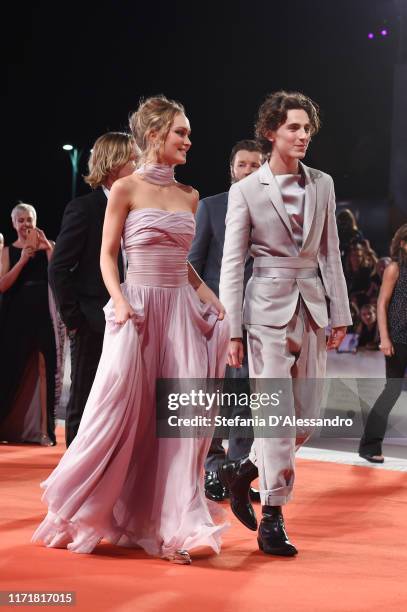 Lily-Rose Depp and Timothee Chalamet attend "The King" red carpet during the 76th Venice Film Festival at Sala Grande on September 02, 2019 in...