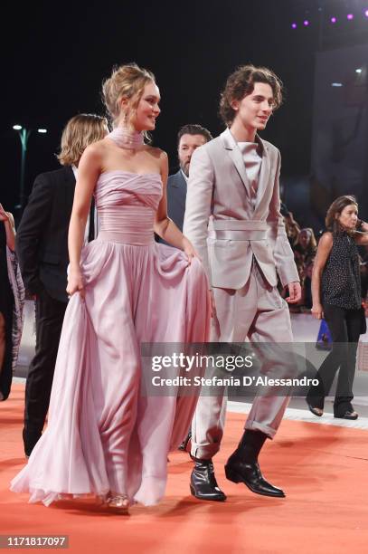 Lily-Rose Depp and Timothee Chalamet attend "The King" red carpet during the 76th Venice Film Festival at Sala Grande on September 02, 2019 in...