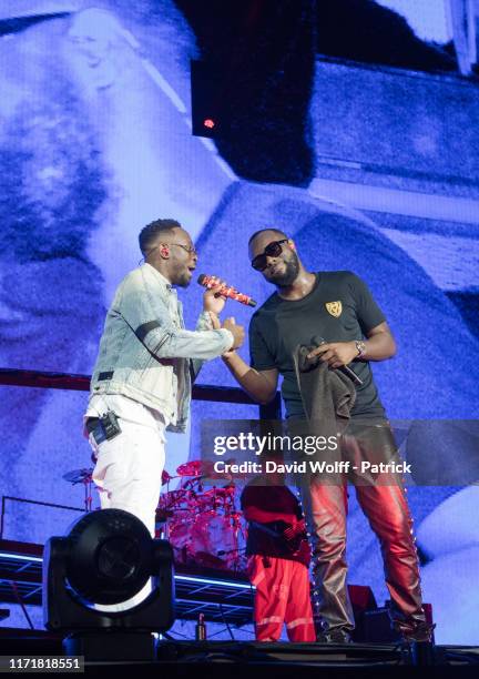 Gims and Dadju perform at Stade de France on September 28, 2019 in Paris, France.