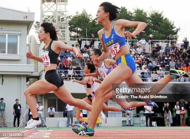 Anna Doi crosses the finish line to win the Women's 100m during the Fuji Hokuroku World Trial at the Fuji Hokuroku Park Athletic Field on September...