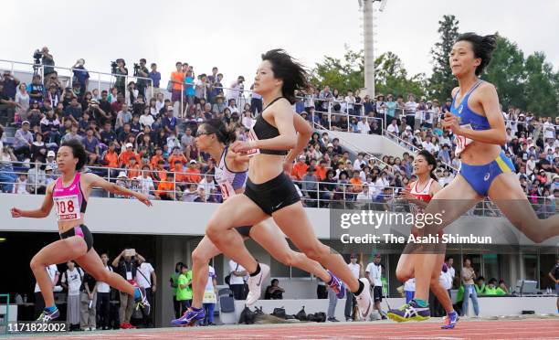 Anna Doi crosses the finish line to win the Women's 100m during the Fuji Hokuroku World Trial at the Fuji Hokuroku Park Athletic Field on September...