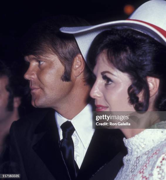 Musician Glen Campbell and Billie Jean Nunley attend Honor America Day on July 4, 1970 in Washington, D.C.