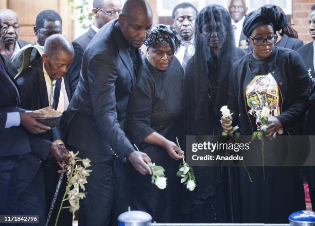 Late and former Zimbabwean president Robert Mugabe's wife Grace Mugabe , his daughter Bona Mugabe and her husband Simba Chikore are seen during the...