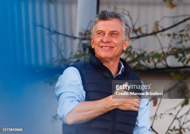President of Argentina Mauricio Macri gestures to his supporters during an event so-called "Si Se Puede" at Barrancas de Belgrano on September 28,...