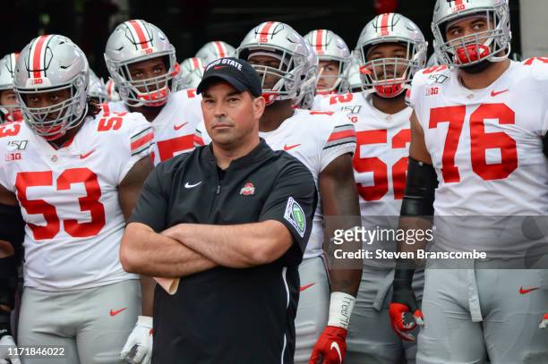 Head coach Ryan Day of the Ohio State Buckeyes waits with his team to take the field before the game against the Nebraska Cornhuskers at Memorial...