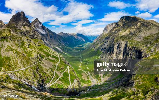 trollstigen or trolls path - serpentine mountain road. norway - condado de more og romsdal fotografías e imágenes de stock