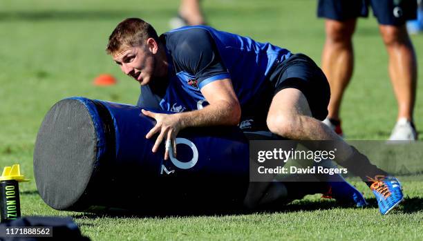 Ruaridh McConnochie dives onto a weight bag during the England training session held on September 03, 2019 in Treviso, Italy.