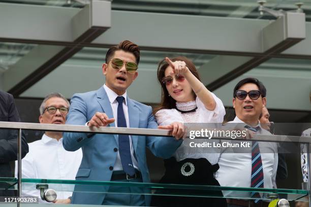 Super star Aaron Kwok Fu-shing and his wife model Moka Fang Yuan watch their horse Dancing Fighter at Sha Tin Racecourse on September 1 , 2019 in...