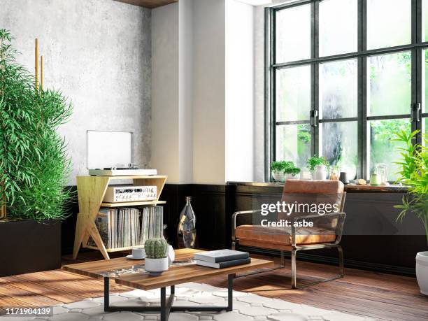 interior with armchair and books - coffee table stock pictures, royalty-free photos & images