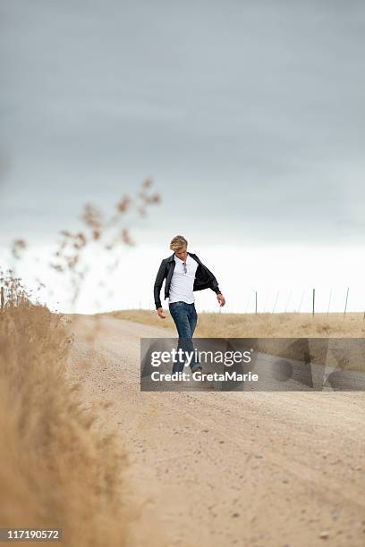 Kicking Rocks Stock Image 3,190 Kick Stone Stock Photos, High-Res Pictures, and Images - Getty Images