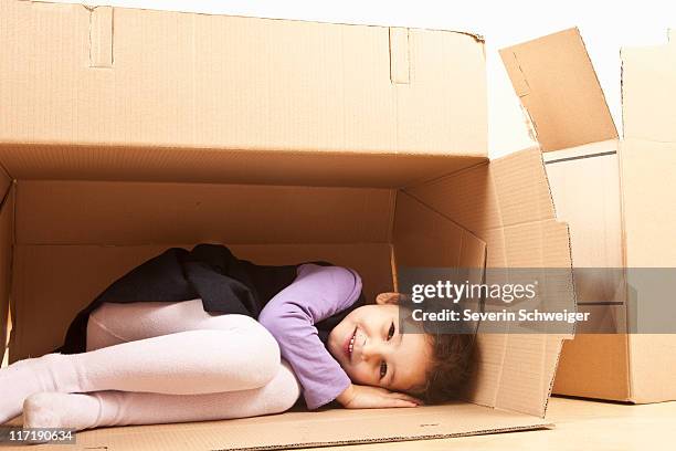 Hiding In Box 765 Child Hiding In Box Stock Photos, High-Res Pictures, and Images ...