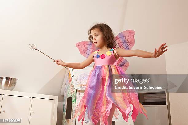 girl in pink dress with fairy wings - fairy stock pictures, royalty-free photos & images