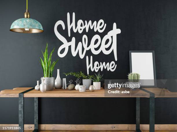 home sweet home sign with table and decors - dark kitchen stock pictures, royalty-free photos & images