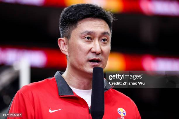 Du Feng former China national team player is interviewed during the 2019 FIBA World Cup, first round match between Lithuania and Canada at Dongguan...