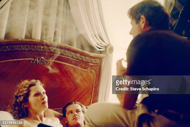 French-born film director Roman Polanski speaks to actors Faye Dunaway and Jack Nicholson on the set of the film 'Chinatown,' Los Angeles,...