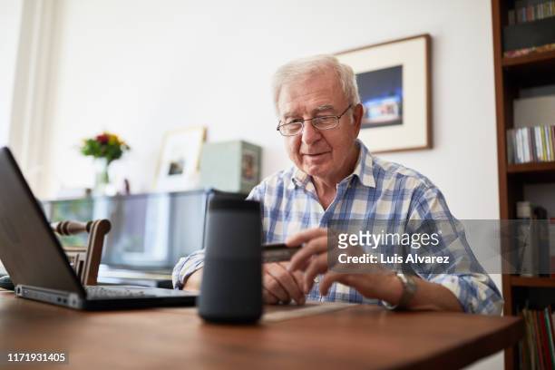 Retired man doing online purchase