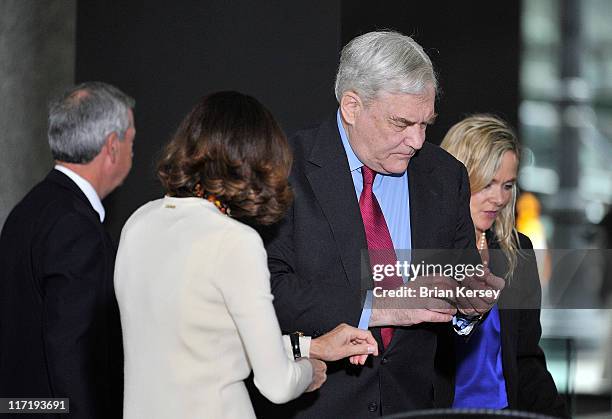 Former press magnate Conrad Black and his wife Barbara Amiel arrive at federal court for a resentencing hearing on June 24, 2011 in Chicago,...