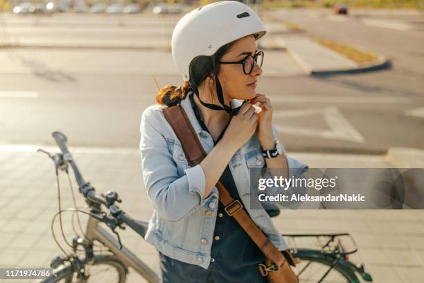 preparing for the bike ride - bicycle safety light stock pictures, royalty-free photos & images