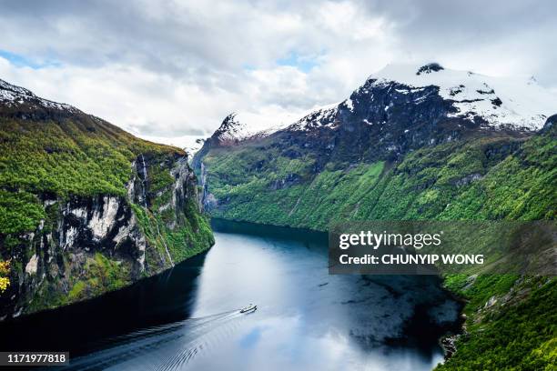 fjord in the clouds - ferry stock pictures, royalty-free photos & images