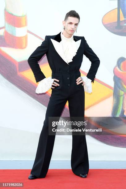 Achille Lauro walks the red carpet ahead of the "Happy Birthday" screening during the 76th Venice Film Festival at Sala Giardino on September 03,...