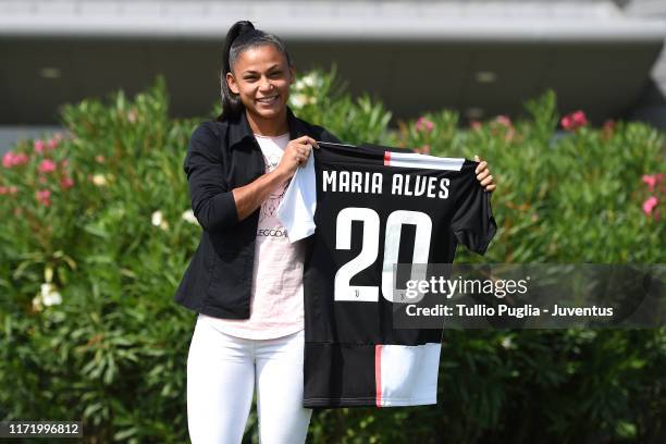 Maria Aparecida Alves Souza, new player of Juventus Women, poses holding her new club shirt at Juventus Training Center Vinovo on September 03, 2019...