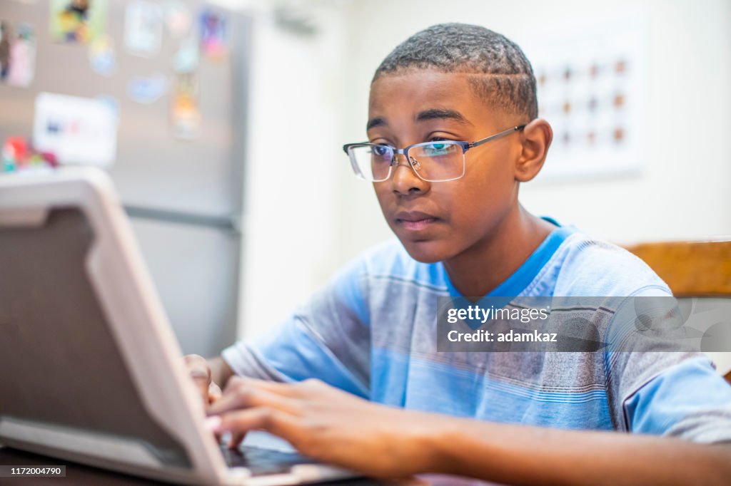 Computer Use For Boy Young Boy Using Computer At Home High-Res Stock Photo - Getty Images