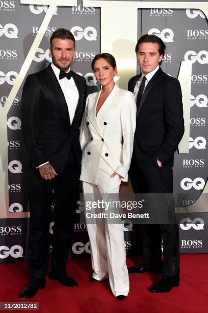 David Beckham, Victoria Beckham and Brooklyn Beckham attend GQ Men Of The Year Awards 2019 in association with HUGO BOSS at Tate Modern on September...