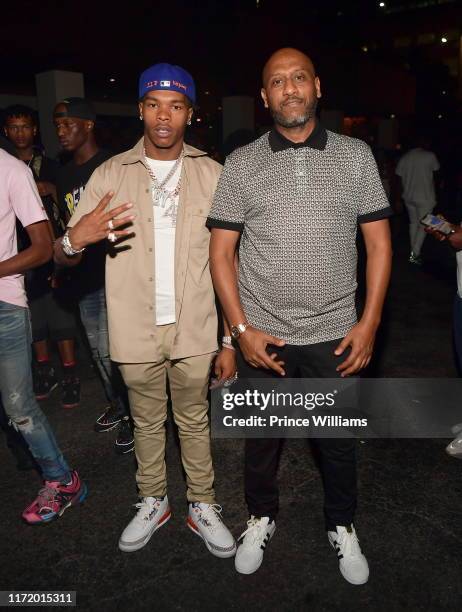 Lil Baby and Alex Gidewon attend Legendary Weekend Grand finale at Gold Room on September 2, 2019 in Atlanta, Georgia.