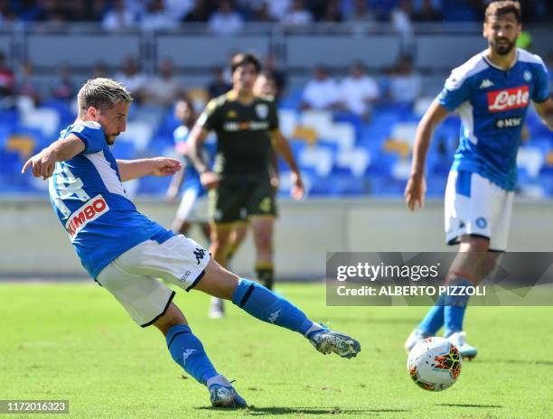 Napoli's Belgian forward Dries Mertens shoots on goal during the Italian Serie A football match Napoli vs Brescia on September 29, 2019 at the San...