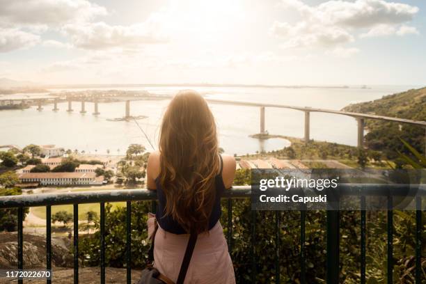 woman enjoying view of vitoria, espirito santo state - brazil skyline stock pictures, royalty-free photos & images