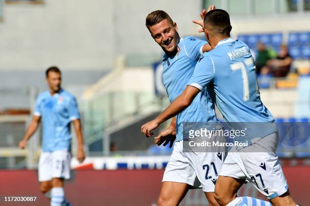 Sergej Milinkovic Savic of SS Lazio celebrates the opening goal with his team mates during the Serie A match between SS Lazio and Genoa CFC at Stadio...