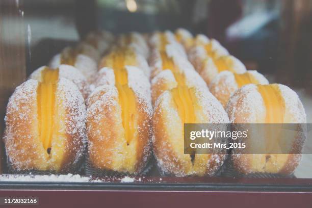 bola de berlim pastries, portugal - カスタード ストックフォトと画像